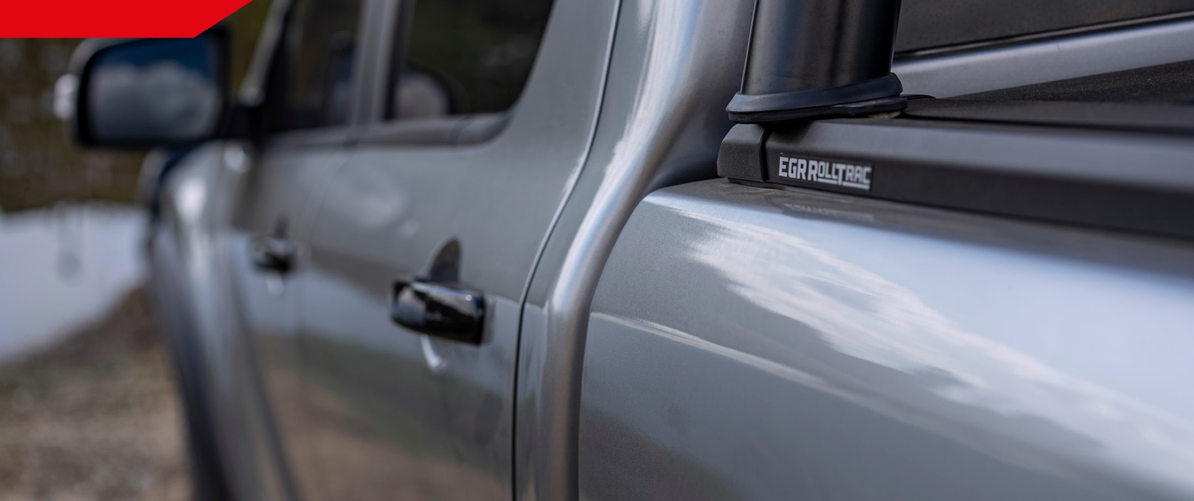 Close-up of an EGR RollTrac tonneau cover rail fitted to a pickup